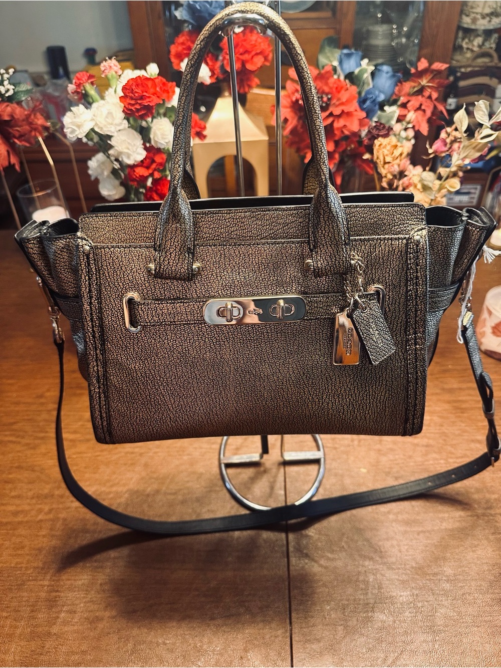 Coach Swagger 27 in Metallic Bronze Pebble Leather with Gunmetal Hardware